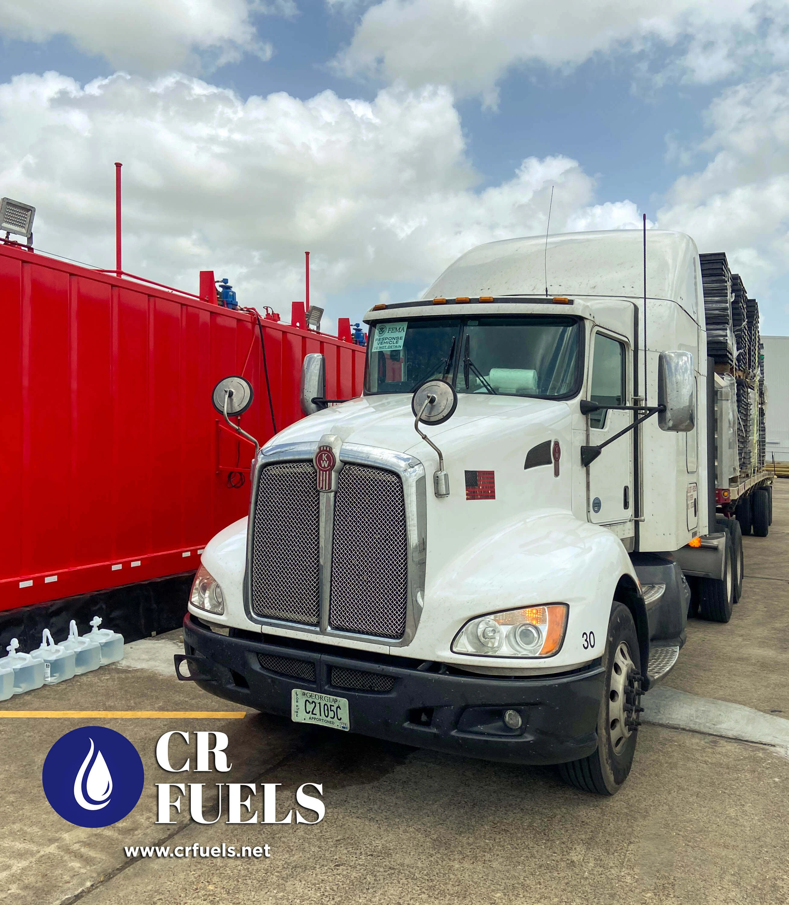 Semi truck with cargo and CR Fuels Logo